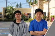 Jonathan and Christian stand outside Dr. Lee's office.
