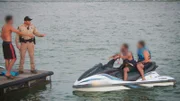 Michael Serbanic is issuing a verbal warning to jet ski drivers.