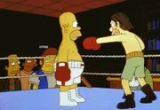 Da Homer nie k.o. geht, avanciert er zum Box-Champ.