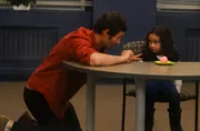 Manhattan, NY - Host Jason Silva talks to a young girl sitting at table during "Resist the Cotton Candy" game, designed to test if kids can resist having cotton candy right now for the future promise of more cotton candy. The kids who succeed in resisting temptation hold the secret to unlocking your brain’s willpower.