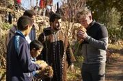 Morocco - Gordon Ramsay (R) stops during his journey to find local ingredients to sample hearts of palm sold by locals on the roadside.