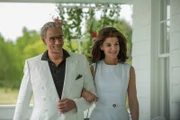 Alexander Siddig as Aristotle Onassis and Katie Holmes as Jackie Kennedy.