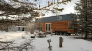 Chris and Brianna’s tiny house looks absolutely stunning in this winter wonderland in Vermont after taking the long trip from Connecticut, as seen on Tiny House, Big Living.