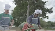 Roy and Ian are catering for a Hawaiian party and are serving a fruit salad, but someone has forgotten the knives! Roy and Ian decide to chop the fruit with their hands!