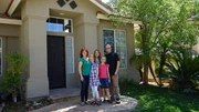 Rowles Family and Robert Akerly in front of House #3