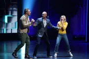 Guests Kristen Bell and Dax Shepard on the set of Brain Games with host Keegan-Michael Key.