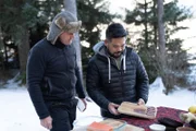 Alaska - (L to R) Gordon Ramsay and Alaskan Chef, Lionel Udippa, work on their Alaskan feast.