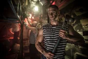 Crew members work tirelessly in the engine room of B-59  (Dramatic Recreation)