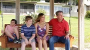 Rowland family takes in the lake view on the porch swing in house 1 in episode 204, as seen on HGTV's House Hunters Family