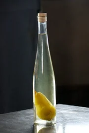 Pear in a Bottle Game designed to tests participants' logic skills based on whether or not they can figure out how the pear got inside a glass bottle.