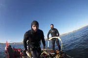 Scott goes for a solo dive.