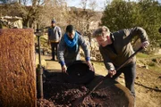 Morocco - On his journey to find the best local ingredients, Gordon Ramsay (R) learns how to operate a traditional grinder to make olive oil.