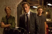 COLONY -- "Fallout" Episode 206 -- Pictured: (l-r) Sarah Wayne Callies as Katie Bowman, Josh Holloway as Will Bowman, Charlie Bewley as Eckhart -- (Photo by: Isabella Vosmikova/USA Network)