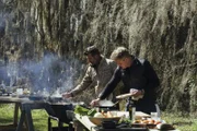 Louisiana - Standing L to R: Gordon Ramsay and Chef Eric Cook serve a cajun feast. (Credit: National Geographic/Rush Jagoe)