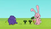 Hase und Elefant ernten Möhren.