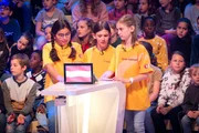 Das gelbe Rateteam aus Seitenstetten/Österreich grübelt über eine von Eltons Quizfragen.