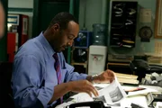 Detective Ed Green (Jesse L. Martin)