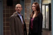 Pictured: (l-r).  Paul Calderon as Marcus Feingold.  Saffron Burrows as Detective Serena Stevens.