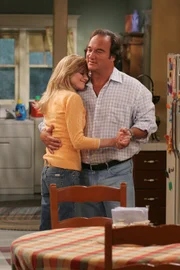 Jim (James Belushi), Cheryl (Courtney Thorne-Smith)