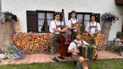 Die vier Musikanten der Volksmusik-Kombo D'Oimhittn Musi.