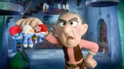 Die Schlümpfe - Schlumpfiger Muttertag - Als Gargamel verzweifelt nach einem Geschenk zum Muttertag sucht, fallen ihm Papa Schlumpf, Schlumpfhilde und Beauty in die Hände, die gerade Blumen pflücken. Ein perfektes Geschenk? Nicht für Gargamels Mutter, die allergisch auf Blumen und Schlümpfe reagiert. Nichts kann Gargamel ihr recht machen. Um ihre Haut zu retten, bieten die Schlümpfe Gargamel ein Geschenk an, das seiner Mutter garantiert gefallen würde: Den Zaubertrank des Bösen. Foto: ORF/IMPS. Veröffentlichung honorarfrei nur für redaktionelle Berichterstattung in Sendungszusammenhang und mit Copyrightangabe. Kontakt: foto@orf.at