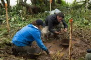 Mehgan Heaney-Grier and Brett Tutor dig for Guarani artifacts.