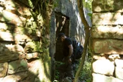 Keith "Cappy" Plaskett examines ruins.