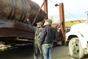 Kevin Beets and Tony Beets stood talking by trommel