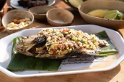 Cooked piranha with vegetables in the Guyana way.