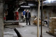 Rob Nelson and historian Larry Johnson explore the basement of the Seelbach Hotel.