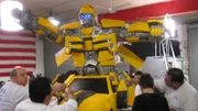 Bakery crew puts finishing touches on GM Cake.