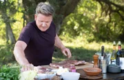 TX - Gordon Ramsay adds a dry rub to ribs before grilling them during the final cook in Texas.