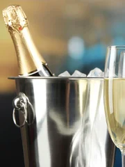 Champagne in glasses on  restaurant background