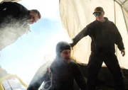 Cody Moen, Shawn Pomrenke and Scott Davenport prepare for a dive at Bluff.