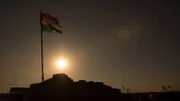 Mosul, Iraq - A Peshmerga flag in the sun