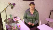 Janine trifft einen beruflichen Entschluss.
