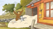 Als Dachs und Dr. Brumm die Tür öffnen, kommen riesige Mengen Popcorn nach draußen.