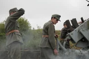 SS soldiers load up weapon to collapse the tunnel.