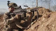 Mosul, Iraq - A US Army service member of the 101st Airborne secures the perimeter in Mosul, Iraq. (National Geographic)