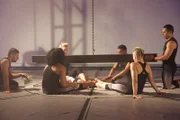 BROOKLYN, N.Y.- Streb action dancers sitting on a mat before the set of Beam.  (Photo Credit: NG Studios/Lee Johnson)