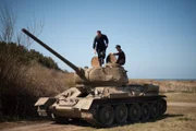 Tiger Loader disembarks from tank.