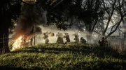 Dramatic recreation of members of the Calgary Highlanders D Company advancing.
