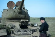 Wittman takes a rest outside the tank.