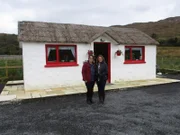 Portrait shot of contributors Kelly Patri (right) and Maria Murphy (left) with agent Keith Anderson in Donegal, Ireland, as seen on Kelly and Maria's house tour on House Hunters International (portrait)