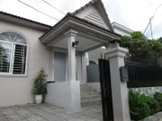 Exterior shot of Western House property in Sihanoukville, Cambodia, as seen on Gosia and Luke Kasprzak's house tour on House Hunters International.