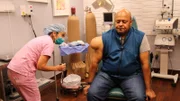 Dr. Lee examining Inoke pre-op.