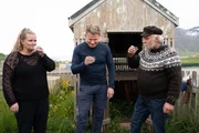 Iceland - Birna (L) and Finboggi (R) introduce Gordon Ramsay (center) to fermented shark and brenevin or "burning wine" in Iceland.