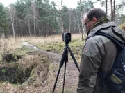 Peenemünde, Germany - Pete Kelsey using his LiDAR scanner at the V2 Test Stand VII.