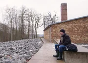 Germany - Marty Morgan outside Mittelbauw-Dora Crematorium.