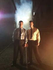 The Kray twins in an alley.